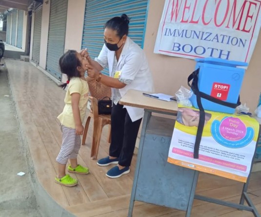 A child recieves polio drops at an immunisation booth in Diphupar on March 3.